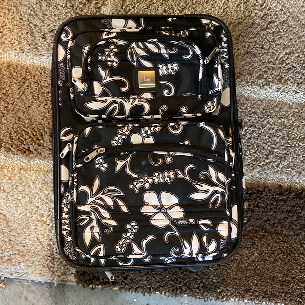 Black and white floral suitcase